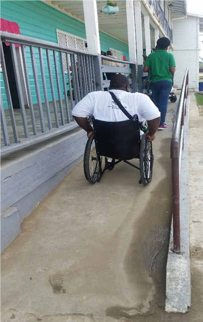 NCD’s Commissioner Hilton Morris testing ramp & toilet are on Feb. 14th , 2018 at Fort Ordnance Primary School